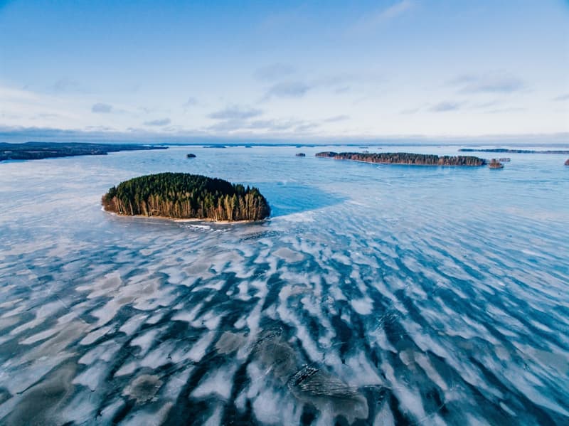 # 2 Snow covered forest and beautiful frozen lake Geography Story: natural ice formations