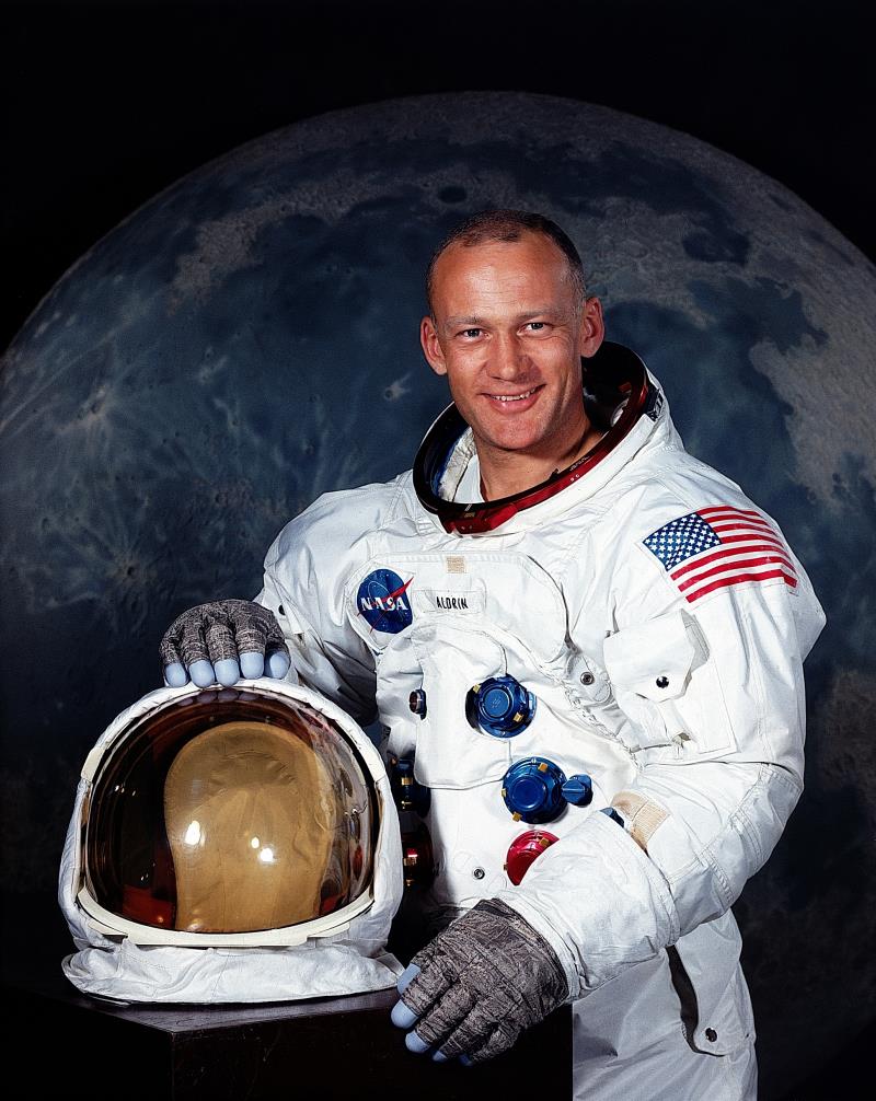 Who was with Neil Armstrong when he stepped on the Moon?