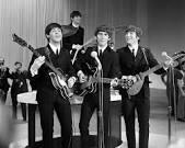 What name was the Beatles band NEVER known by?