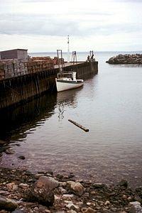 Bay of Fundy is known for having the highest tidal range in the world. Where is it located?