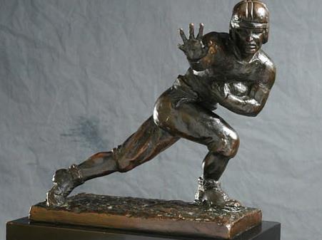Who is the only football player to win the Heisman Trophy twice?