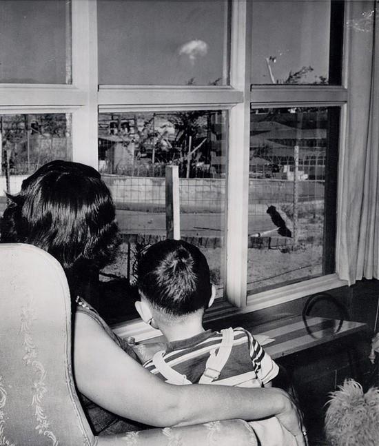 It's 1953. A mom and her son watch the mushroom cloud after an atomic test. But where was the photo taken? It's 1953. A mom and her son watch the mushroom cloud after an atomic test. But where was the photo taken?