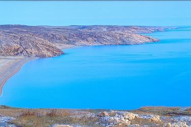 Which country has the world's longest coastline and shares the world's longest land border?