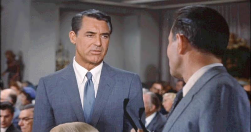 In Hitchcock's "North by Northwest", which actor is credited with the part of George Kaplan?