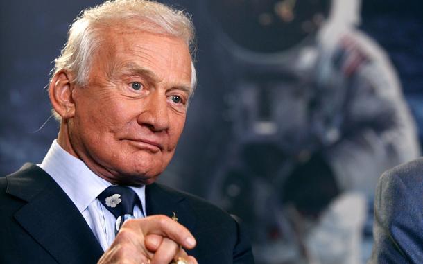 What investigative reporter was punched by astronaut Edwin (Buzz) Aldrin, on September 9, 2002, for having challenged him that NASA's moon missions were all faked?" What investigative reporter was punched by astronaut Edwin (Buzz) Aldrin, on September 9, 2002, for having challenged him that NASA's moon missions were all faked?"