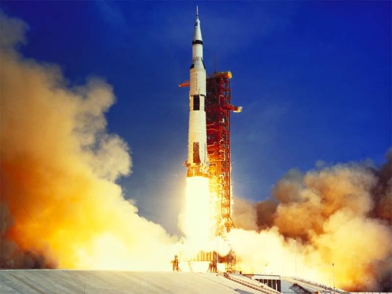 Which Apollo mission landed the first humans on the Moon?
