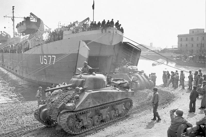 What American General failed to capitalize on the element of surprise at Anzio by delaying his advance until he judged his position was sufficiently consolidated and his troops ready? What American General failed to capitalize on the element of surprise at Anzio by delaying his advance until he judged his position was sufficiently consolidated and his troops ready?