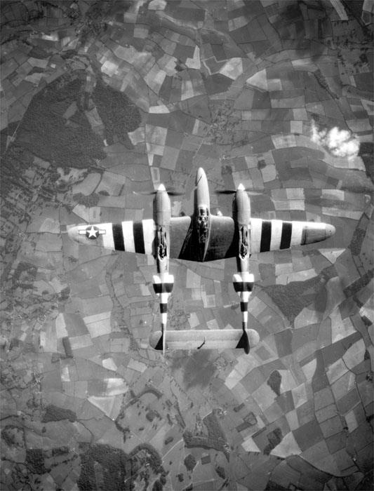 History Trivia Question: The photo is of a P-38 during the Normandy campaign of WW2. Why does it have huge black-and-white stripes? History Trivia Question: The photo is of a P-38 during the Normandy campaign of WW2. Why does it have huge black-and-white stripes?