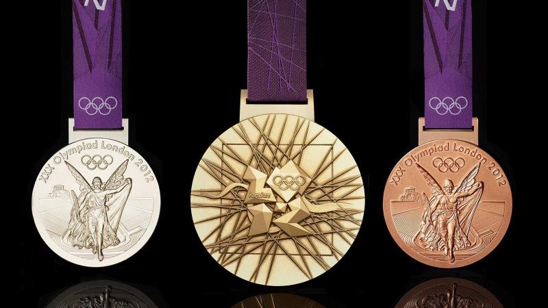 Sport Trivia Question: When was the custom of awarding gold, silver and bronze medals first introduced into the Olympic games? Sport Trivia Question: When was the custom of awarding gold, silver and bronze medals first introduced into the Olympic games?
