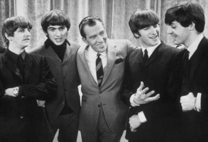 How many songs did the Beatles sing on the Ed Sullivan Show on February 9th 1964?