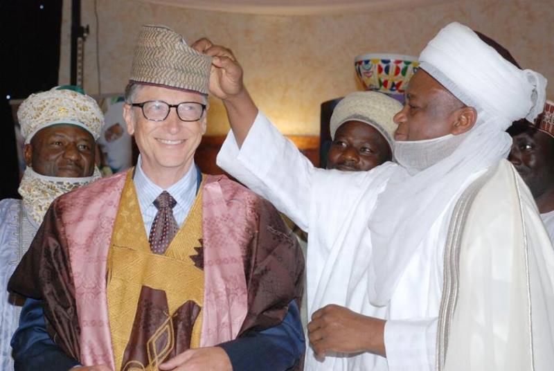 What is the name of the traditional regalia worn by Bill Gates in this picture?