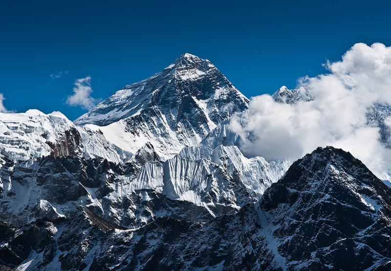 How many mountains in the U.S. have summit (peak) elevations between 20,350 feet and 9800 feet? How many mountains in the U.S. have summit (peak) elevations between 20,350 feet and 9800 feet?
