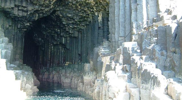 Fingal's Cave in Scotland is lined with columns of what type of rock?