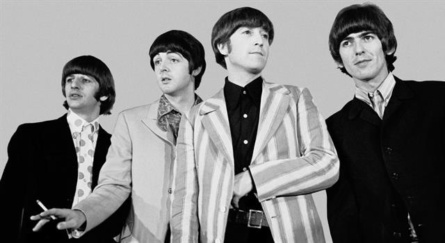 Of the 13 studio albums the Beatles released, which is the only one that has all of the album's songs written on its front cover?