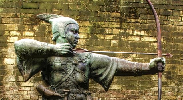 The theme song of what TV show included the line 'Fightin' the system like two modern day Robin Hoods'?