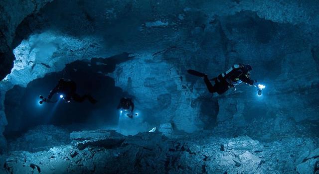 What is the world's record depth for cave diving?