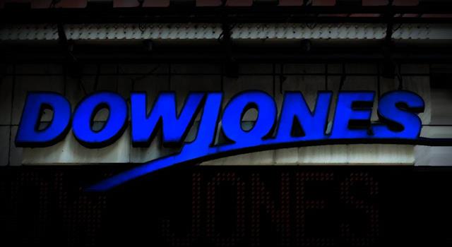 When did the Dow Jones industrial average first close over the 1,000 mark?