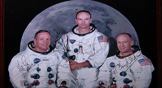 Which insurance company insured the lives of the Apollo 11 astronauts?