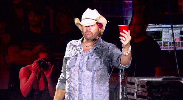 How many hit songs referencing drinking has Toby Keith recorded?