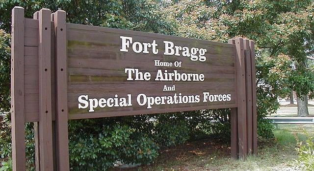Who is the only civilian buried in the Special Forces cemetery at Ft Bragg, NC?