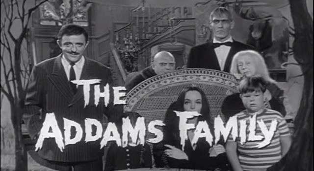 What was in the jaws of the swordfish mounted on the wall in "The Addams Family" house? What was in the jaws of the swordfish mounted on the wall in "The Addams Family" house?