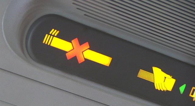 What was the first airlines to ban smoking on domestic flights?