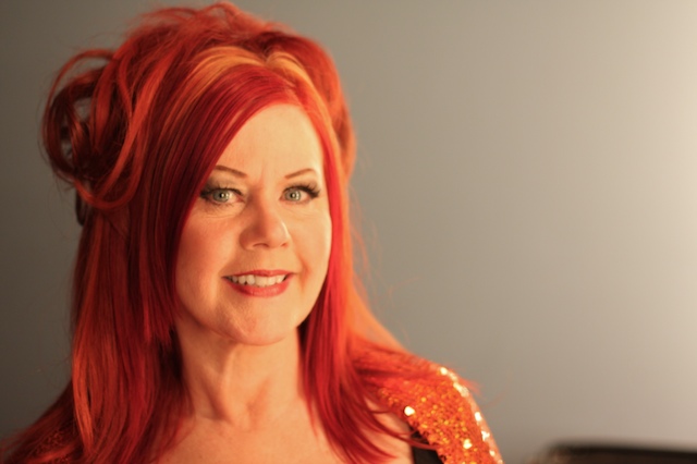 The woman pictured below was a member of what musical group?