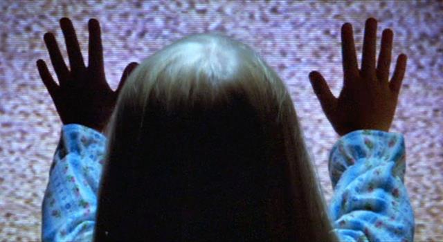 Movies & TV Trivia Question: What kind of a doll grabs Robbie and drags him under his bed in the 1982 film "Poltergeist"? Movies & TV Trivia Question: What kind of a doll grabs Robbie and drags him under his bed in the 1982 film "Poltergeist"?